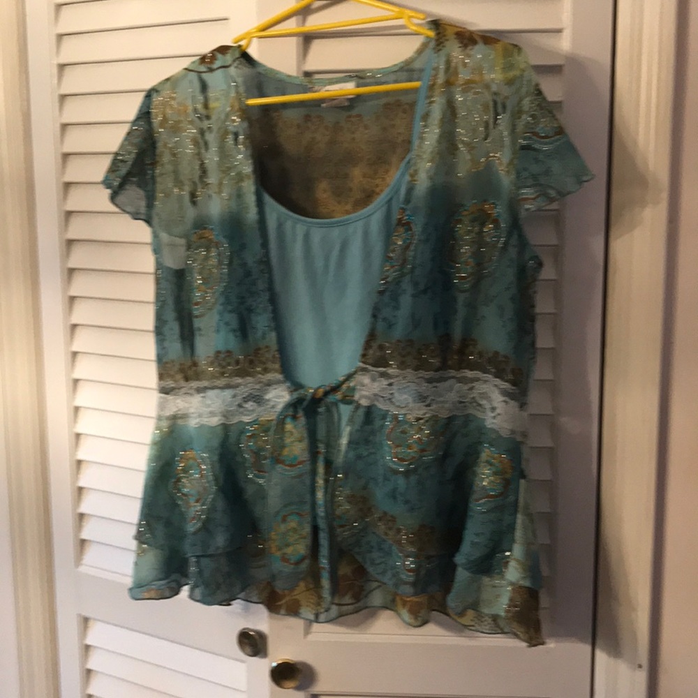 Blouse set with blue, gold and silver detail.